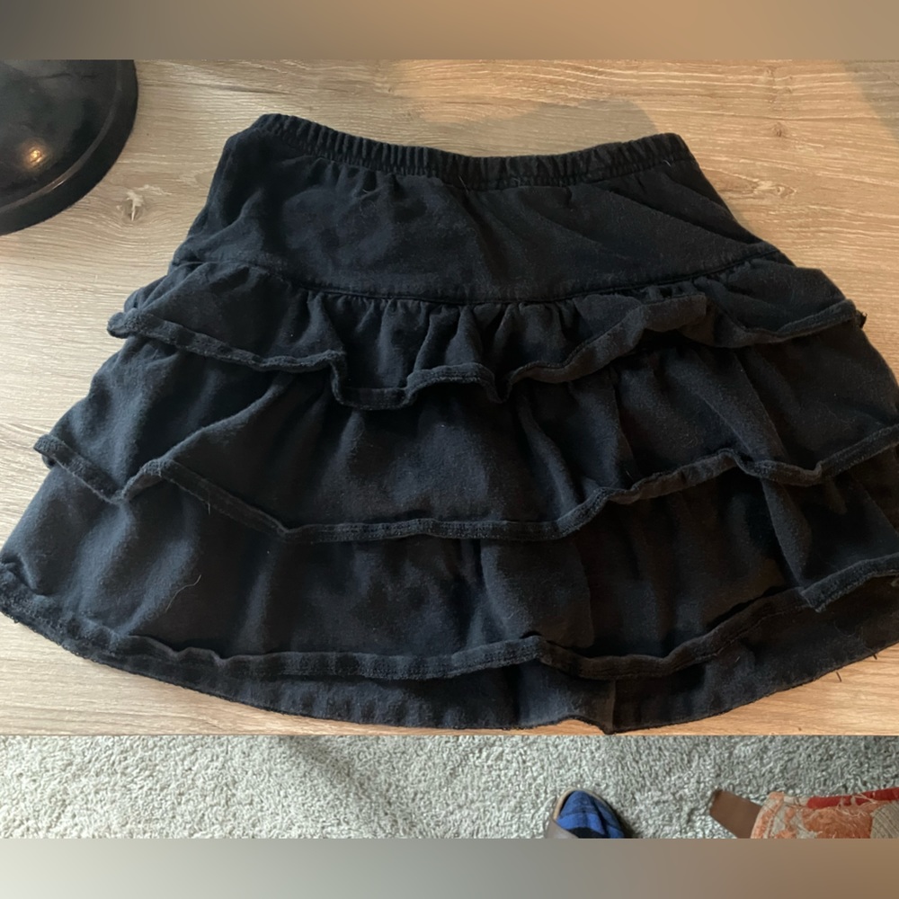 Girls black ruffle skirt with built in shorts